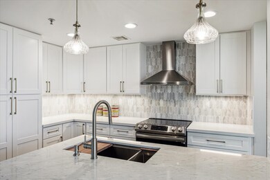 Beautiful details in the kitchen include a stainle