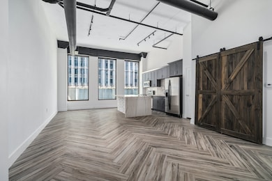 Elegant porcelain tile floors throughout the commo