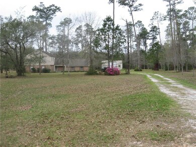 View from the road- large front setback and mature