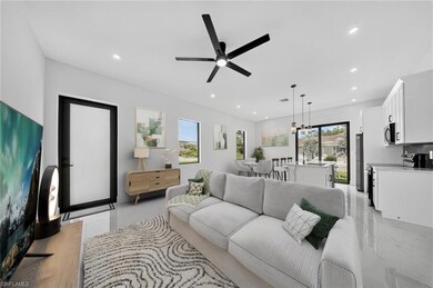 Living area featuring healthy amount of natural light, recessed lighting, and ceiling fan