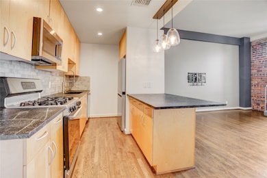 Bayou Lofts unit 5L, Houston, TX 77002 - photo 5