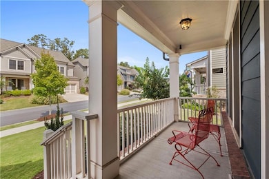 Covered porch with a residential view