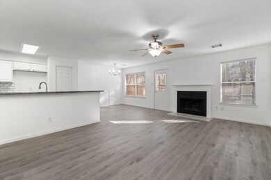 This bright living space features an open floor pl