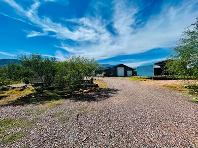 Triple garage plus 3 carports