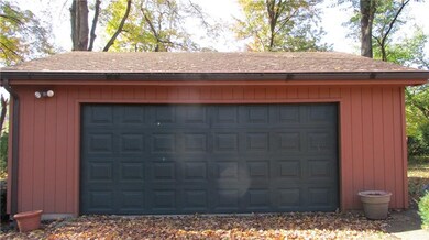 The 2 car garage is oversized to store lawn equipm