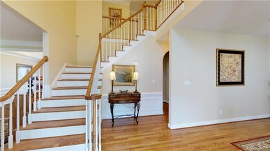 Gleaming hardwood floors throughout Main Level of 