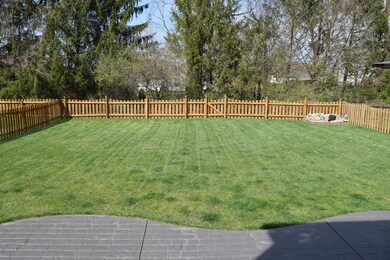 Sprawling fenced yard