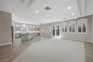 Unfurnished living room featuring recessed lighting and light wood-style floors