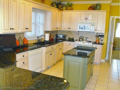 Kitchen. This gorgeous kitchen includes a breakfas