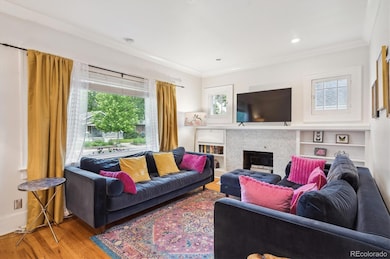 The fireplace & built-in bookshelves cozy it up.