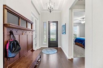 Step inside the foyer to be greeted by lovely tray ceilings with crown molding and an upgraded light fixture. This home also offers zoned A/C and heating, plus a pre-wired Vivent alarm system for added peace of mind.