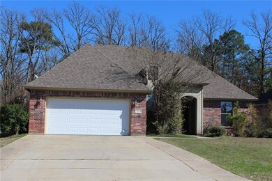 FRONT: Paved walkway from driveway to front door