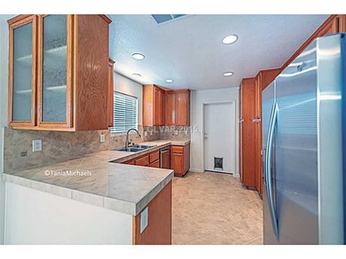 Property Photo. Kitchen with brand new stainless s