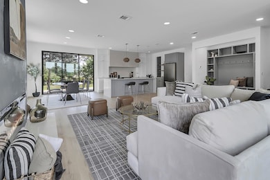 Living area featuring recessed lighting and light