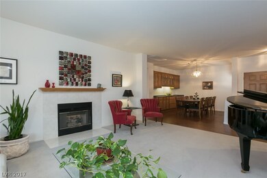 Living room facing dining area. The fireplace is t