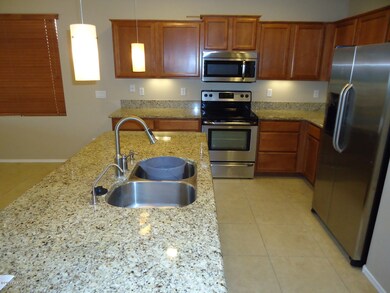 Kitchen w/ Gorgeous Pendant Lighting