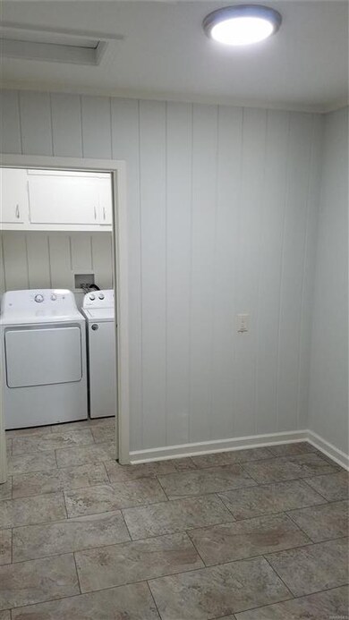 Just inside the carport door is this mudroom and L