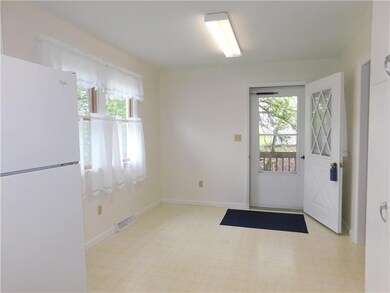 Very nice eat in area of kitchen, with a door to t
