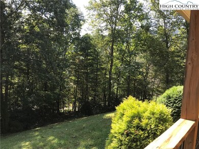 Front yard has lovely mature trees and shrubbery--