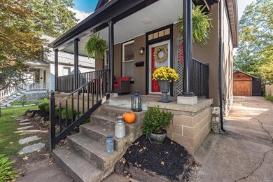 Romantic wrap around porch and front door with transom are just the beginning of a journey to perfection!