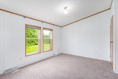 Bedroom 1, the primary bedroom with attached ensuite bathroom