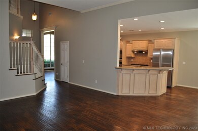 Family room opens to the kitchen breakfast bar