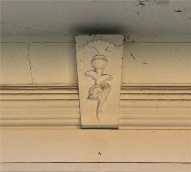 Architectural Thistle Detail above front door