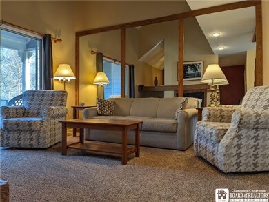 Living room opens to the porch and the sola is a s