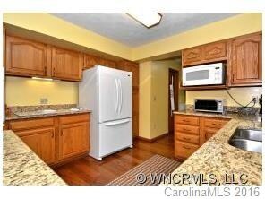 View of kitchen toward pantry and mudroom