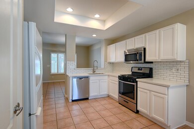 Kitchen with New Counters and Backsplash
