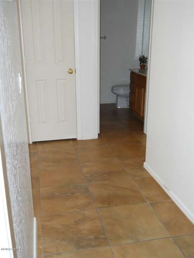 LARGE TILE T/O HALL WAY