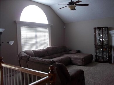 Living room with huge windows and gas fireplace