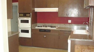 upgraded kitchen with high gloss enamel with grani