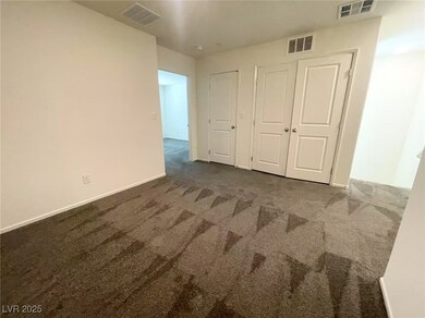 Unfurnished bedroom with carpet floors and baseboa