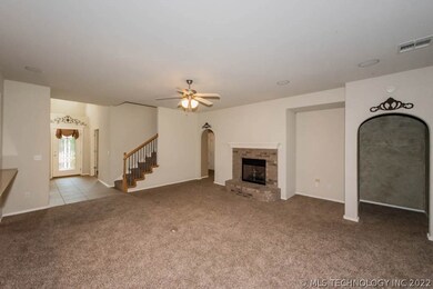 The front door is at the left side of this photo.