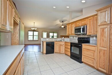 Spacious kitchen with plenty of cabinet space.