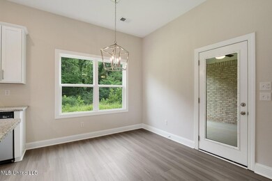Photo is of a similar home,
