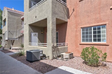 Entrance to property with central AC and stucco si