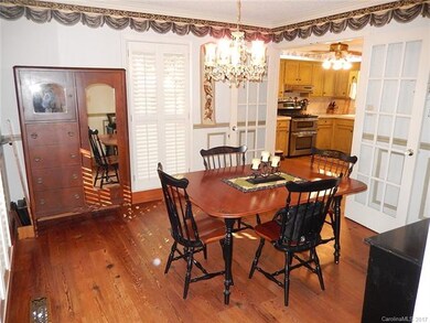 DINNING WITH HARDWOODS & PLANTAION SHUTTERS