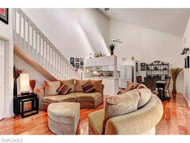 This living room photo shows the open floor plan w