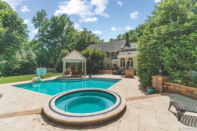 Gunite pool, spa, travertine surround