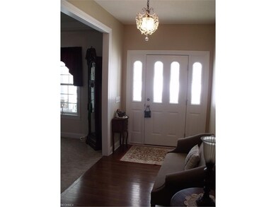 Foyer.  Formal dining room off foyer with access t