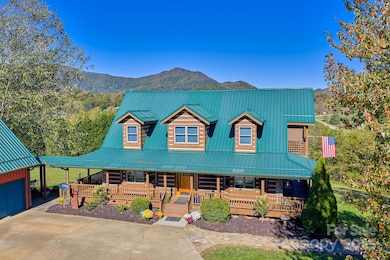 Your rustic mountain cabin estate awaits—just minutes from vibrant downtown Asheville and charming Waynesville!