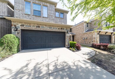 Traditional-style house featuring brick siding, an