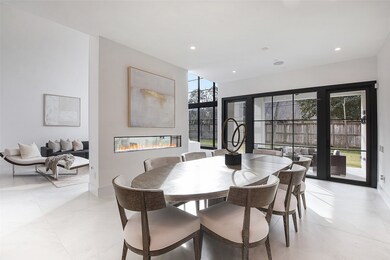 The dining room and living room create an open gat