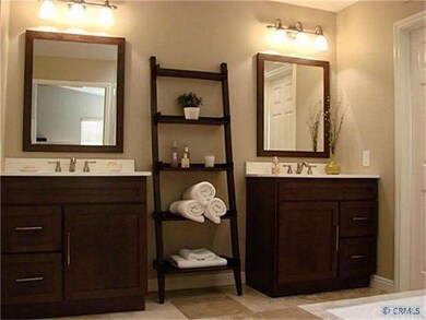 Upgraded master bath with double vanities.