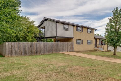 Home is on a level lot with 2 driveways.