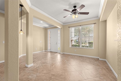 Open floor plan - elegant with columns and crown moldings