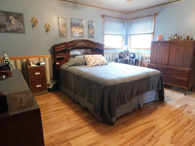 Bedroom 2 has abundant lighting and a walk in closet