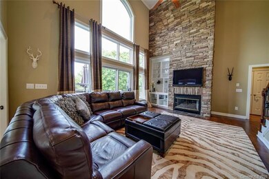 2-STORY GREAT ROOM features- floor to ceiling STON